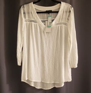 Light weight 3/4 length sleeve top.